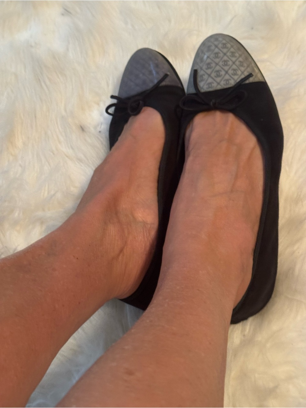 CHANEL Black Ballet Flats with Silver Logo Cap